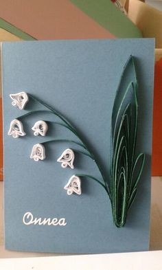 a greeting card with flowers on it and the word'onera'written in white