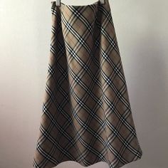 Plaid Wool Skirt. Classic Design And Pattern. A Line Silhouette. Hidden Zipper At Side. Fully Lined. Tags Removed. Perfect Condition. 26 Inches Long. Waist 12.25 Inches Measured Flat. Line Silhouette, Plaid Wool Skirt, Wool Skirt, Wool Skirts, Wool Plaid, Women Skirts Midi, Cream White, Hidden Zipper, Classic Design