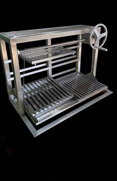 an image of a metal rack with food on it's sides and wheels attached to the shelf