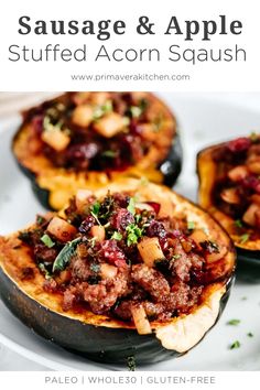 sausage and apple stuffed acorn squash on a white plate with text overlay that reads, sausage and apple stuffed acorn squash