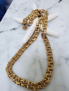 Beautiful Givenchy heavy goldtone chain with the Givenchy logo. Chain drop is 11 inches. Measures 25 inches to the end of the logo. Appox. 1/2 inch wide. Any questions or information I have not covered in my description please ask. Check out my wife's etsy shop Arlettemichelle and my son John's shop Jmoriginalart just put their shop name in the etsy search bar all one word. Big Gold Chains, Disco Hair, Givenchy Jewelry, Givenchy Logo, Bridal Jewelry Collection, Shop Name, Gold Chains For Men, Search Bar, One Word