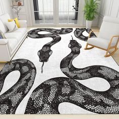 a black and white snake rug in a living room