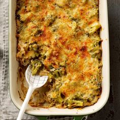 a casserole dish with broccoli and cheese