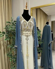 Buy Stylish Luxuries Steel Blue & White Inner Jacket Kaftan Embroidered Zari Work Wedding Dress - African Attire Shop Elegant Hand Embellished Dress For Ceremony, Elegant Floral Embroidered Floor-length Kaftan, Elegant Floor-length Floral Embroidered Kaftan, Elegant Floral Embroidery Floor-length Kaftan, Hand Embellished Floor-length Dress For Ceremony, Ceremonial Gown With Pearl Embroidery, Blue Floor-length Embroidered Dress For Wedding, Wedding Abaya With Floral Embroidery, Elegant Embroidered Kaftan For Reception