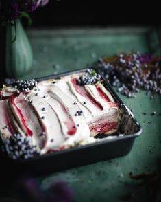 a close up of a cake in a pan on a table