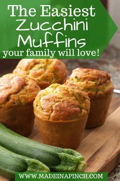 some zucchini muffins are on a cutting board