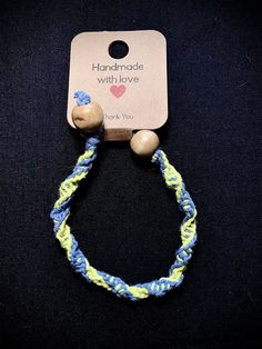 Blue and yellow hemp thread bracelet with wooden beads Thread Bracelet, Thread Bracelets, Bracelet Blue, From Santa, Braided Bracelets, Blue Bracelet, Blue And Yellow, Wooden Beads, Friendship Bracelets