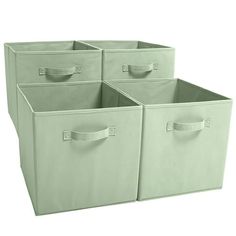 three green storage bins with handles on each side