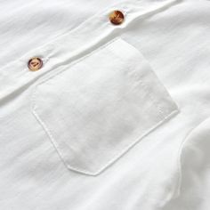 Upgrade your child's summer wardrobe with our 100% Cotton dress shirt, perfect for kids aged 1-6 years! Designed with attention to detail and crafted for comfort, this shirt will keep your little one looking sharp and feeling great all day long. With a classic button-front design and handy front pocket, it adds a touch of sophistication to any outfit. The lightweight cotton fabric is breathable and airy, perfect for warm summer days. The versatile white color allows for both casual and formal st White Summer Shirt With Button Closure, White Summer Shirt With Pockets, One Summer, Shirt Dress Casual, Spring Shirts, One Piece Dress, Front Design, Mandarin Collar, Cotton Dress