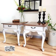 two white tables with wooden top sitting next to each other on a hard wood floor