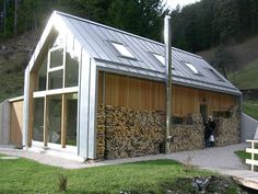 a small house made out of wood and metal