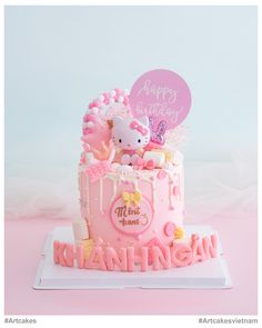 a hello kitty birthday cake with pink frosting