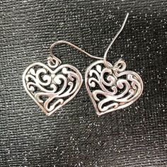 Minimalist silver filigree heart dangle earrings. Lovely and lightweight these earrings can be worn anytime, with anything. A perfect go-to earring for any occasion.  Hypoallergenic ear wires (nickel and lead free). Choose ear wire style below. See more of my silver earrings here: https://www.etsy.com/shop/JezaJewelry?ref=simple-shop-header-name&listing_id=1365982282&section_id=40032290 A gift for you or someone special, earrings are carded and in an organza bag. More of my silver earrings: http Elegant Metal Heart Earrings With Ear Wire, Pierced Metal Earrings Open Heart Shape, Heart-shaped Filigree Earrings For Gift, Elegant Nickel-free Open Heart Earrings, Antique Silver Earrings, Filigree Heart, Silver Heart Earrings, Reno Nv, Gothic Accessories