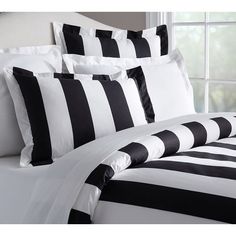 black and white striped bedding in a bedroom