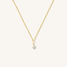 Our Pearl Drop Necklace is an essential piece to the minimalist's jewelry collection. It features a single freshwater rice pearl suspended on a dainty chain. Delicate & comfortable, you'll forget it's even there. Easy to layer with your other favorites! DETAILS Necklace length: 16" with 2" extender 14k gold filled -or- sterling silver spring clasp & findings 4x5mm rice freshwater pearl Safe for sensitive skin & shower safe Matching earrings: Pearl Drop Threader Earrings, Pearl Drop Hoop Earrings Modest Jewelry, Earrings Pearl Drop, Gold Drop Necklace, Holiday Wishlist, Drop Hoop Earrings, Pearl Drop Necklace, Detailed Necklace, Dainty Chain, Necklace Simple