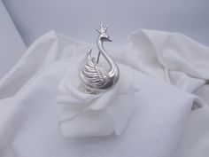 This is a vintage sterling silver LANG swan brooch. This lovely sterling pin is wonderfully detailed with the swan wearing a regal crown. This brooch is 2" long & in very nice condition. Swan Brooch, Silver Swan, Sterling Silber, Vintage Sterling Silver, Halloween Shopping, Favorite Jewelry, Brooch Pin, Brooches, Accessory Gift