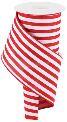 red and white striped ribbon on a roll