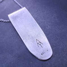 Pendant is crafted in .999 Fine Silver using Metal Clay. The Ogham is hand carved and can per personalized with up to 5 letters. (If you require more than 5 letters please contact me for a price as it does require more silver.) Ogham is an ancient alphabet used during early medieval times, in what is now the UK, for marking territories on trees and stones, read from bottom to top. Ogham only consists of 19 letters (No J, K, P, V, W, X, or Y) but substitutions can be made because the Ogham langua Personalized Etched Pendant Jewelry, Spiritual Engraved Jewelry For Personalized Gift, Rectangular Pendant Jewelry With Engraving Option, Rectangular Pendant Jewelry With Engraving Option For Gifts, Engraved Rectangular Pendant Jewelry Gift, Gift Jewelry With Engraving Option: Rectangular Pendant, Spiritual Memorial Jewelry With Engraving Option, Spiritual Engraved Rectangular Jewelry, Engraved Sterling Silver Nameplate Jewelry