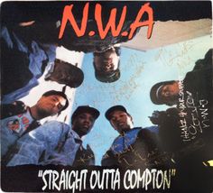 an autographed album cover for nwa's straight outa compton