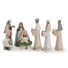 a group of figurines that have been made to look like they are in the nativity scene