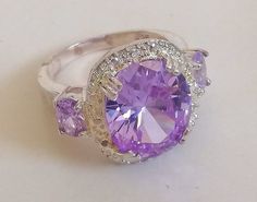 Very beautiful and elegant silver plated ring with violet (purple) crystals. This shining and very feminine ring is great for an elegant evening dress, engagement, or just a wonderful gift for every day's shine. IT is made in royal (or Hollywood) style. The ring has size 7 (17.5 mm diameter) - a very typical women's size - and came in excellent condition. It has a stamp 925 on it. Dress Engagement, Dress Feminine, Style Royal, Hollywood Style, Violet Purple, Hollywood Fashion, Evening Dresses Elegant, Feminine Dress, Plated Ring