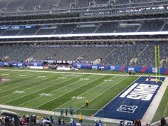 an empty football stadium filled with people