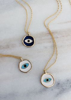 Ready to ship. Sustainably Sourced Materials. Our evil eye necklace is made by hand with enamel, Hangs from a 16” double chain 14k gold plated. Available in 2 colors. Evil Eye Hand, Evil Eye Art, Eye Pendant Necklace, Hand Necklace, Blue Evil Eye, Minimal Jewelry, Eye Pendant, Evil Eye Pendant, Double Chain