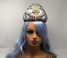 Blue, Silver, and Gold Mermaid Crown with real seashells, blue beads, and gold chain Just what you always dreamed of, being a creature of the sea, a mermaid. Whether you are a siren, goddess, princess, evil witch, or fairy sea creature, you deserve this crown to portray your true self! Use it for beach weddings or mermaid cosplays.  This crown was made to fit an adult comfortably. This crown has a comfortable headband with metal combs to hold it on your head. The gold chain accents your face with a small bead attached. Each of these crowns have been handmade by me, using real seashells, starfish, gems, pearl beads, and crystals. Each crown is unique making no two alike. If you are interested in a custom piece, or having several matching pieces for events such as a wedding, please message m Siren Goddess, Orange Mermaid, Gold Mermaid, Evil Witch, Mermaid Crown, Comfortable Headbands, Metal Headbands, Crown Headband, Costume Hats