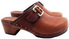 Leather Slip-on Mules With Tang Buckle, Leather Mules With Tang Buckle And Round Toe, Leather Clogs With Buckle Closure And Round Toe, Classic Brown Clogs With Buckle Closure, Brown Leather Mules With Buckle Closure, Classic Clogs With Buckle Closure And Round Toe, Classic Slip-on Clogs With Buckle, Brown Slip-on Mules With Buckle Closure, Classic Slip-on Clogs With Buckle Closure