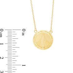 Celebrate her faith with this gleaming Virgin Mary medallion necklace. Fashioned in warm 10K gold, this thoughtful style showcases a traditional miraculous medal design gleaming with the profound "O Mary conceived without sin pray for us who have recourse to thee." On the back, the symbolic details are certain to be appreciated. Polished to a bright shine, this look suspends centered along a 17.0-inch cable chain that secures with a spring-ring clasp. Round Miraculous Medal Necklace For Anniversary, Miraculous Medal Necklace With Round Pendant For Anniversary, Anniversary Necklace With Miraculous Medal Pendant, Spiritual Yellow Gold Necklace With Miraculous Medal, Anniversary Necklace With Miraculous Medal, Miraculous Medal Necklace For Anniversary, Gold Miraculous Medal Round Pendant Jewelry, Gold Round Pendant With Miraculous Medal, 14k Gold Miraculous Medal Jewelry