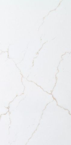 a white marble counter top with cracks in it