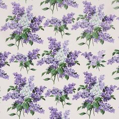 purple flowers on white background with green leaves and stems in full bloom, all over print