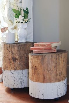 two wooden stools sitting on top of a hard wood floor