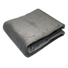 the comforter is made from grey velvet and has a quilted pattern on it