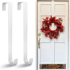 the door handle is white and has a wreath hanging on it's front door