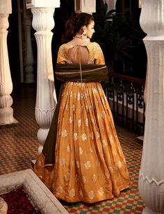 Editor's Note Featuring a yellow dyed lehenga with attached can-can, all-over woven floral motifs and zardozi embroidery on the waistband. It comes with embroidered padded full sleeves blouse and olive border embroidered dupatta. Fabric: Tissue Color: Yellow Sleeves: Full Neckline: V-neck Component: Lehenga, blouse and dupatta Occasion: Haldi & mehndi Care: Dry Clean Only About the Designer Matsya by Utkarsh Ahuja curated for the princess in disguise, royal humility at the heart of a simple life Dyed Lehenga, Full Sleeves Blouse, Full Sleeve Blouse, Zardozi Embroidery, Embroidered Lehenga, Lehenga Blouse, Embroidered Dupatta, Sleeves Blouse, Can Can