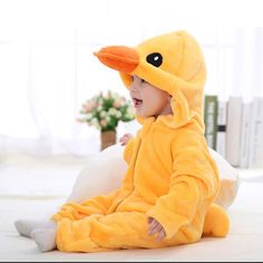 Lovely baby one-piece bird duck dress up hooded jumpsuit costume for newborn, infant & toddler boys and girls. Long sleeve hoodie coverall outerwear to keep arms and legs warm. Banded cuffs to keep sleeve from riding up. Zip closure from neck to ankle. Nickel free metal parts to prevent skin irritation. Made from softest cotton against delicate skin. Clothing is machine wash safe. More sizes are available for this baby clothing set. Winter Costume, Animal Onesie, Toddler Pajamas, Hooded Flannel, Little Duck, Baby Rompers, Pink Rabbit, Baby Jumpsuit, Flannel Material