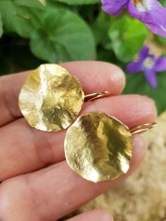 Gold hammered round disc earrings. Simple and elegant design.They can be a great  holiday gift.Gold plated earrings with goldfilld post.-14 karat plating-Gold plated brass-Goldfilled post-Free shipping-Comes in a jewelry boxTo see these earrings in sterling silver, please follow this link: https://www.etsy.com/your/shops/TamyZurTachshit/tools/listings/stats:true/684161019To see more of my Earrings. please follow this link:https://www.etsy.com/il-en/your/shops/TamyZurTachshit/tools/TamyZurTachshi Hammered Round Disc Earrings For Gift, Hammered Round Disc Earrings As Gift, Hammered Yellow Gold Circular Earrings, Yellow Gold Hammered Circle Earrings, Gold Hammered Circle Earrings, Hammered Yellow Gold Round Disc Earrings, Hammered Brass Round Disc Earrings, Gold Disc Earrings, Statement Earrings Gold