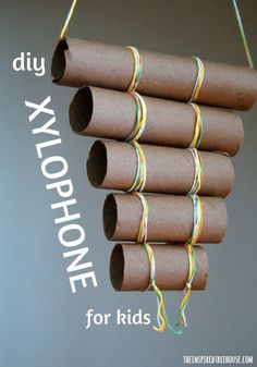 several rolls of toilet paper are hanging from a string with the words diy, yoyophone for kids