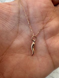 Italian Horn Necklace / Horn Necklace/ 14K Rose Gold Horn Necklace / Gold Horn Necklace / Solid Gold Horn / Mini gold Horn Pendant   FREE SHIPPING  WITHIN THE USA METAL: 14K SOLID ROSE GOLD 585 STYLE: ITALIAN HORN NECKLACE PURITY: 14K 585 SIZE: 14MM BY 2.6MM MINI HORN AS IT IS WITH THIS ITEM ALL MY PIECES ARE HAND MADE. AND I STAND BEHIND EVERY PIECE. SATISFACTION GUARANTEED. FIND OUT ABOUT OUR LAYAWAY PAYMENT PLAN AND HASSLE FREE RETURNS  IF THERE IS ANY ADJUSTMENTS NEEDED TO SUIT YOUR TASTE, I Fine Jewelry Rose Gold Charm Necklace, Rose Gold 14k Gold Necklaces With Charms, Rose Gold 14k Gold Charm Necklaces, Rose Gold 14k Gold Charms Necklace, 14k Rose Gold Jewelry For Gift, 14k Rose Gold Fine Jewelry Necklace, 14k Rose Gold Necklace, Minimalist 14k Rose Gold Necklace, 14k Rose Gold Necklaces For Jewelry Making