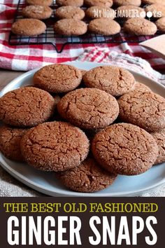 the best old fashioned ginger snaps recipe on a white plate with red and black checkered tablecloth