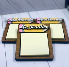 three sticky notes on a wooden board with magnets attached to them that say, miss station