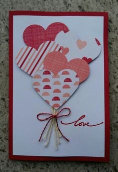 a valentine's day card with hearts on it