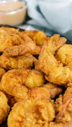 some fried food is sitting on a cooling rack