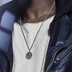 The front of this silver-tone steel pendant features the Immaculate Heart of Mary. On the reverse, a central ‘M’ stands for “Mary, Mother, Mediatrix.” The cross rising from its top represents the cross of Jesus’ redemption, and the 12 stars surrounding it symbolise the 12 apostles. Under the M are 2 flaming hearts. The left one is crowned with thorns, representing Jesus; and the one on the right is pierced by a sword, representing Mary. The flames at the top of both represent the love they have Silver Cross Pendant Necklace With Box Chain, Silver Polished Medallion Necklace, Oxidized Stainless Steel Medallion Necklace, Oxidized Silver Stainless Steel Necklace, Silver Oxidized Stainless Steel Necklace, Silver Tarnish-resistant Medallion Necklace, Symbolic Silver Tarnish Resistant Medallion Necklace, Symbolic Silver Tarnish-resistant Medallion Necklace, Symbolic Silver Medallion Necklace Tarnish Resistant