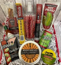 an assortment of snacks and condiments in a basket