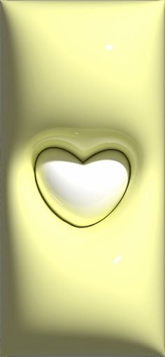 a heart shaped hole in the center of a yellow square frame with light coming through it