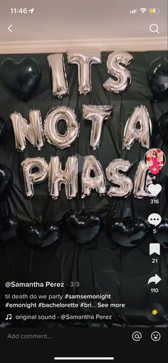 balloons that say it's not a phasn on the wall in front of an advertisement