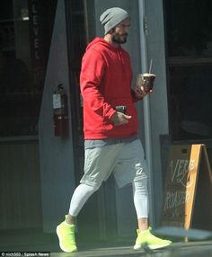 Refreshing: He was last seen raising a glass in a new whiskey commercial, but David Beckham was in the mood for something a little softer during a recent appearance in West Hollywood Sporty Outfits Men, David Beckham Style, Hoodie Adidas, Gym Outfit Men, Smen, Red Sweatshirt, Winter Outfits Men, Mens Workout Clothes, Mens Lifestyle