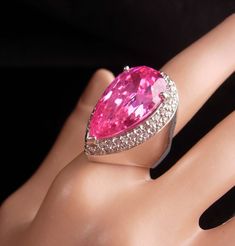 "This is a Vintage STUNNING huge statement Pink Faux topaz brilliant Cocktail Ring. This large setting silver plate is a size 7. The setting measures almost 1 1/2\" x and is surrounded by brilliant cz's. You definitely get compliments when you wear this! 11-3-19" Exquisite Party Rings With Accent Stones, Pink Rings With Sparkling Stones For Formal Events, Party Jewelry With Accent Stones In Cubic Zirconia, Party Jewelry With Cubic Zirconia Accent Stones, Dazzling Party Jewelry With Accent Stones, Silver Topaz Gemstone Ring For Party, Elegant Silver Rings For Birthday, Elegant Rings With Diamond Accents For Birthday, Silver Topaz Ring For Party